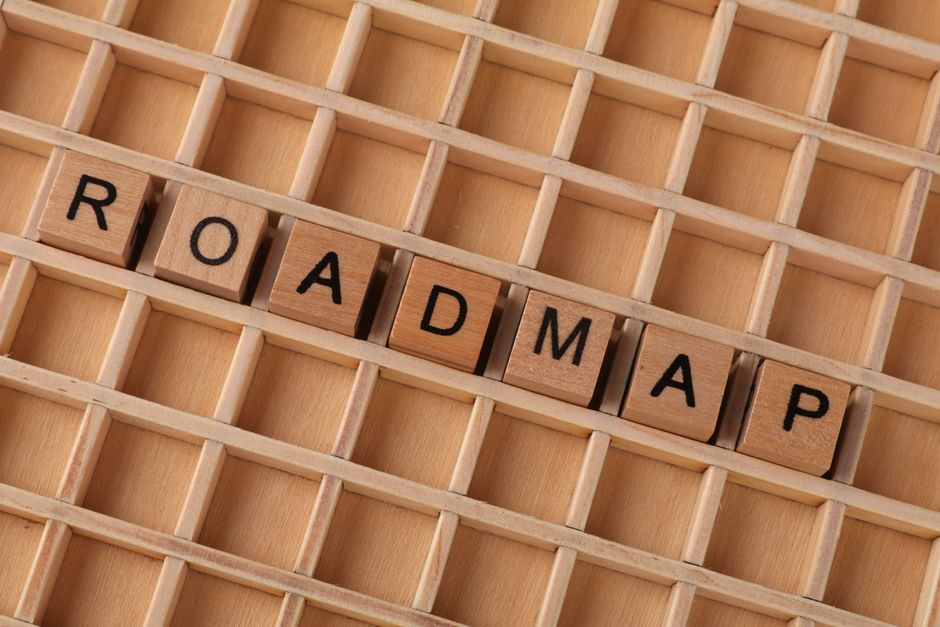 Isometric illustration of strategic planning and a 5-year brand development roadmap